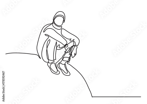 one line drawing of traveler sitting on hill