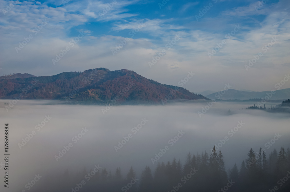 Foggy morning in the Ukrainian Carpathian Mountains in the autumn season
