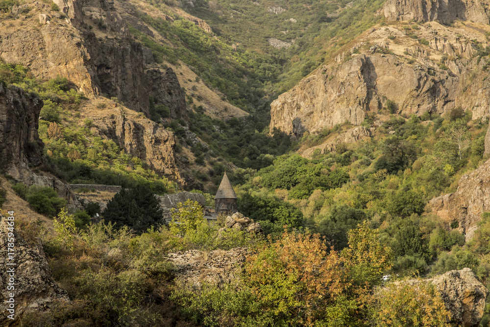 Obraz premium The Christian temple Geghard in the mountains of Armenia
