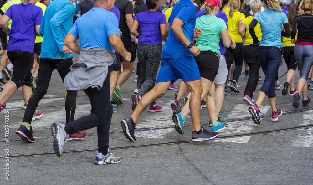 Marathon running race on the city road Marathon running race on the city road