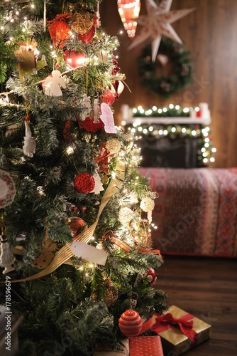 Christmas tree, bed and fireplace. © dojo666