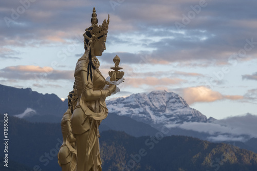 Female Goddess and Himalayas  near Buddha Dordenma Statue  Thimphu
