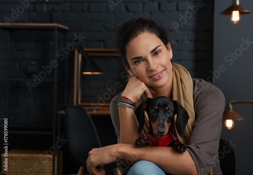 Portrait of beautiful mid adult woman with dog