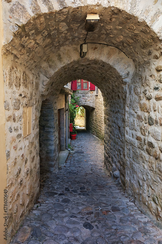 Old subpass in the village Labeaume in the Ardeche region of France photo