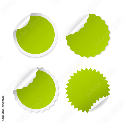 Green round sticker with curled corner
