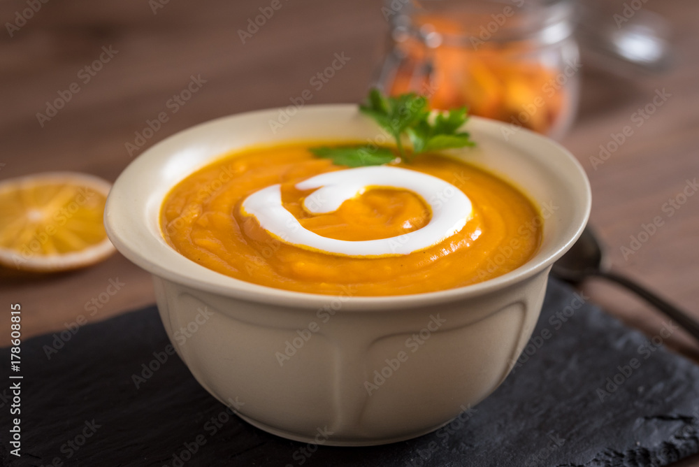Creamy pumpkin soup with vegetables and spices. Creamy pumpkin soup with vegetables and spices.