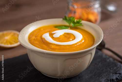 Creamy pumpkin soup with vegetables and spices.