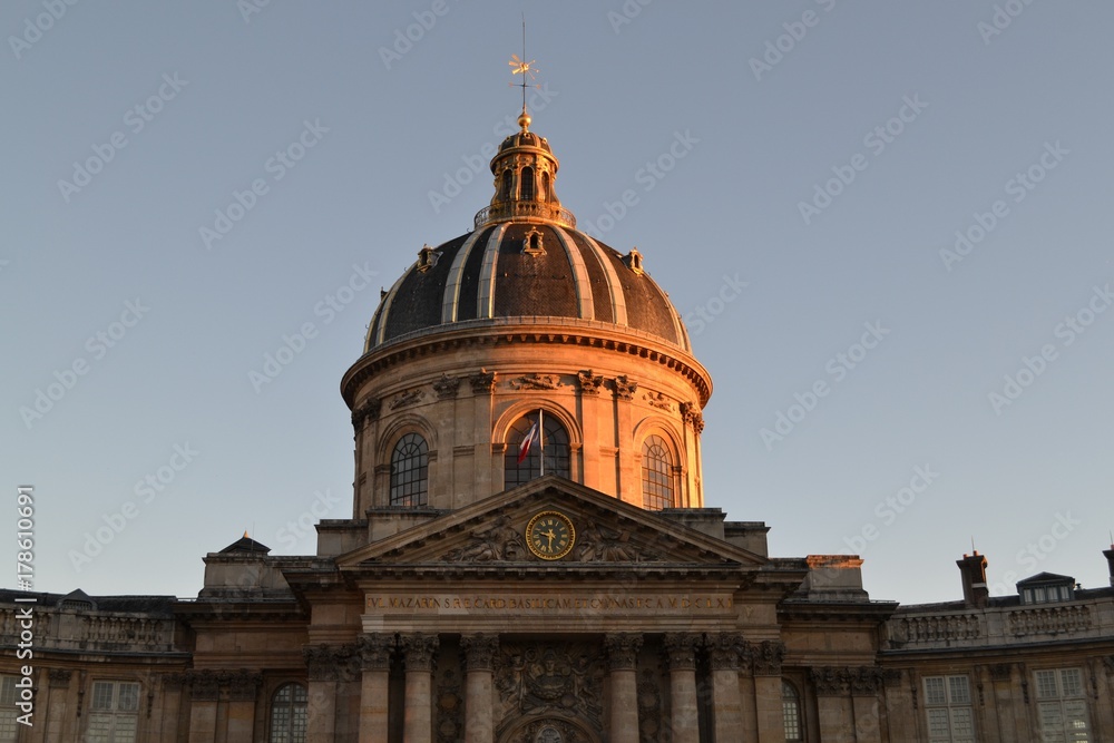 Institute of France (Institut de France) from Paris, majestic cultural landmark and building of French Academy, at sunset