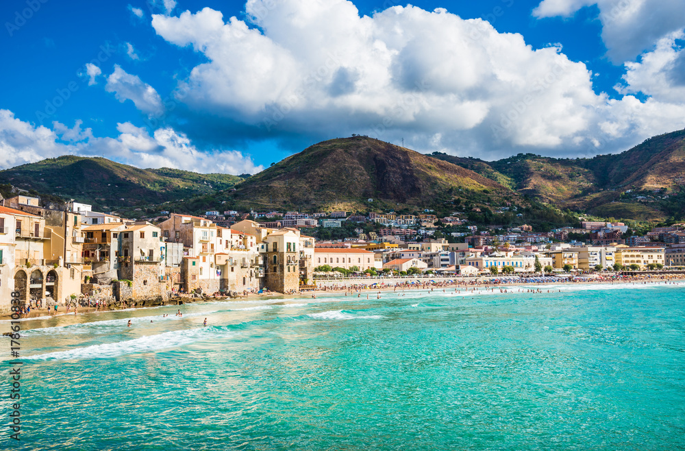 Beautiful bay of Cefalu town, panoramic view of  harbor and old houses in Cefalu, province of Palermo, Sicily. 