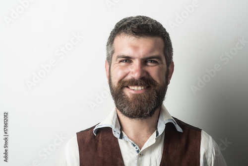 man with long beard on happy face