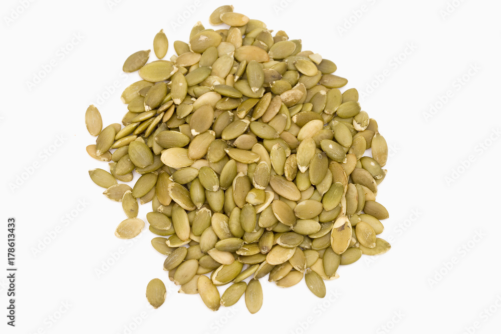 Shelled Pumpkin Seeds on a White Background Shelled Pumpkin Seeds on a White Background