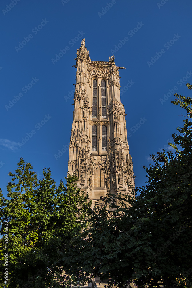 Saint-Jacques Tower (Tour Saint-Jacques) located on Rivoli street in Paris, France. This 52 m Flamboyant Gothic tower is all that remains of former XVI century Church of Saint-Jacques-de-la-Boucherie. Saint-Jacques Tower (Tour Saint-Jacques) located on Rivoli street in Paris, France. This 52 m Flamboyant Gothic tower is all that remains of former XVI century Church of Saint-Jacques-de-la-Boucherie.