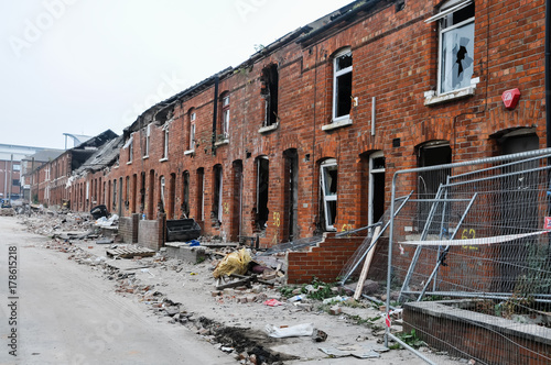 Slika na platnu Derelict terraced houses ready to be demolished to make way for new homes