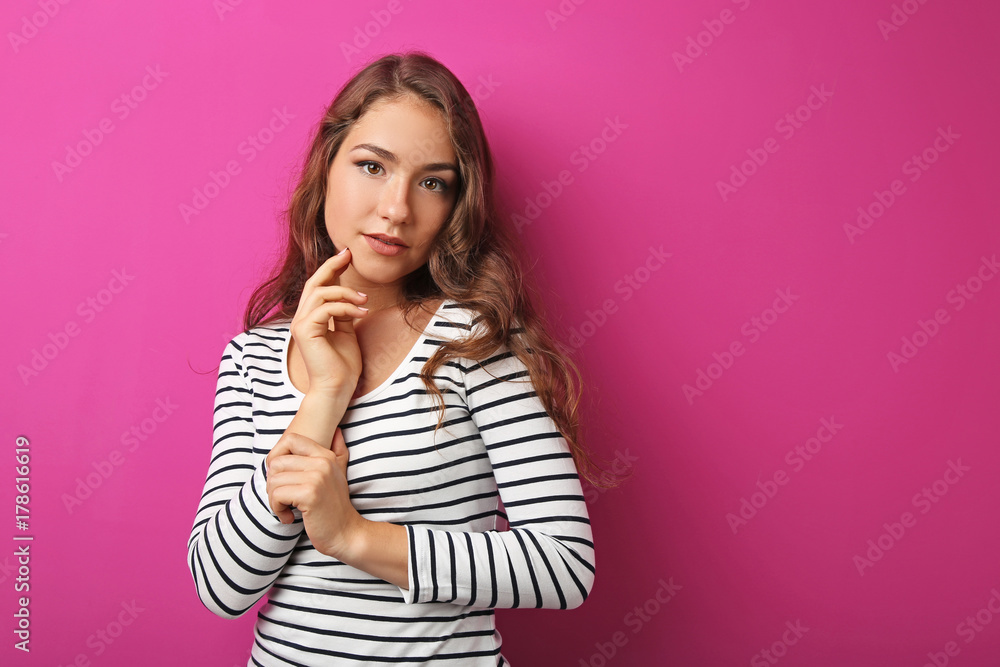Portrait of young woman on pink background Portrait of young woman on pink background