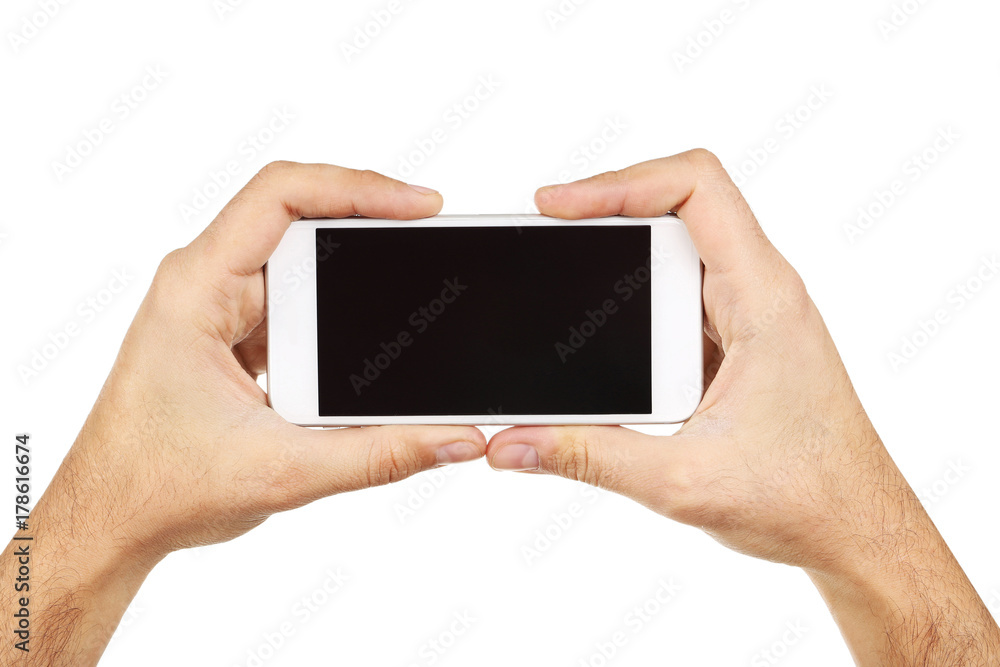 Male hands holding smartphone on white background Male hands holding smartphone on white background