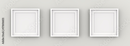 White Picture Frames on Wall. Row of 3 Square White Frames on wall with white Passe-partout. Blank for Copy Space. 3D render.