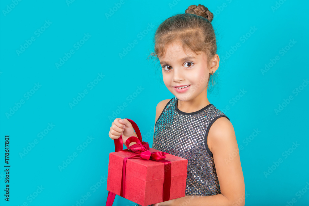 Beautiful little girl with a gift Beautiful little girl with a gift