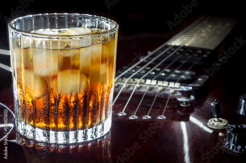 The night blues on the guitar. Ice whiskey