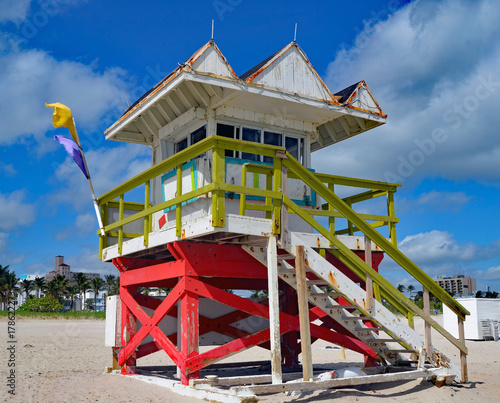 A weathered ocean-rescue stations survivor of Hurricane Irene on the beach in the south beach section of Miami Beach,Florida photo
