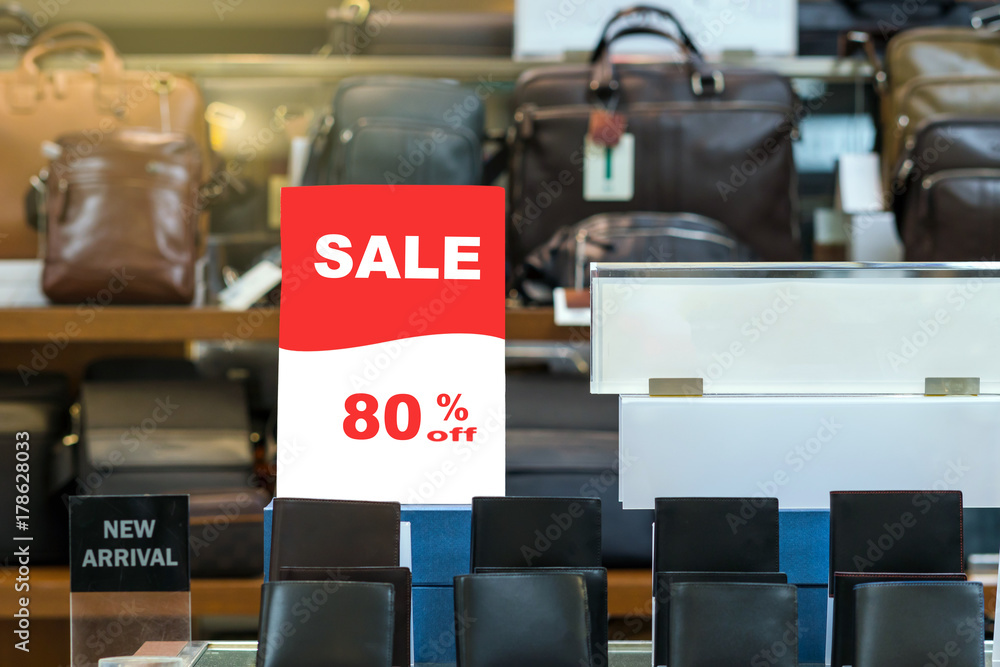 Obraz premium sale 90 off mock up advertise display frame setting over the stack of wallet in the shopping department store for shopping, business fashion and advertisement concept