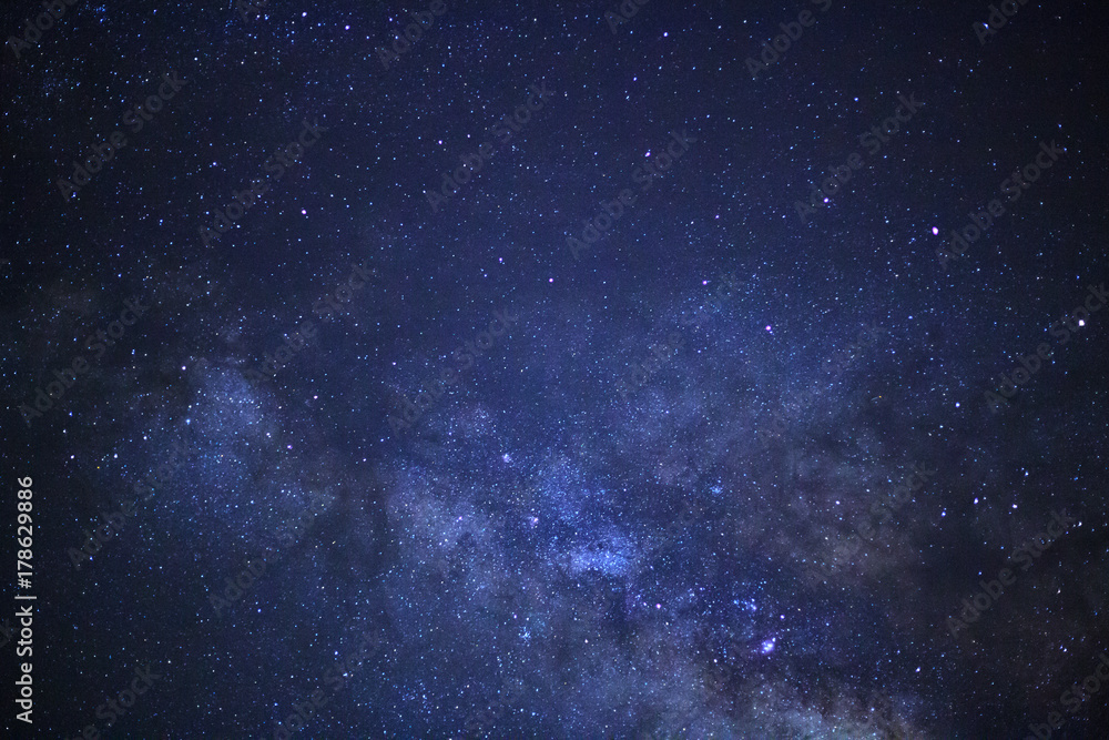 Milky way galaxy with stars and space dust in the universe, Long exposure photograph, with grain. Milky way galaxy with stars and space dust in the universe, Long exposure photograph, with grain.
