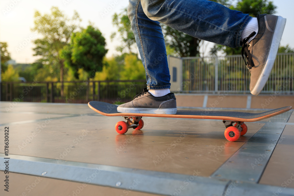 skateboarder legs skateboarding on skatepark ramp skateboarder legs skateboarding on skatepark ramp