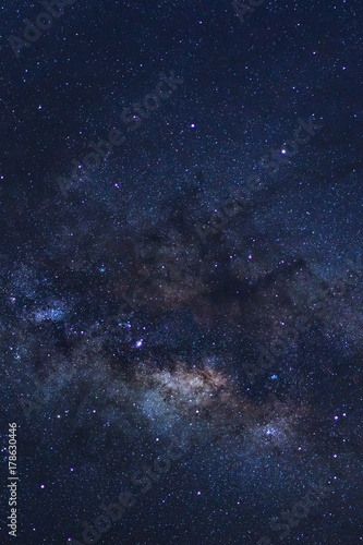 Starry night sky, Milky way galaxy with stars and space dust in the universe, Long exposure photograph, with grain.