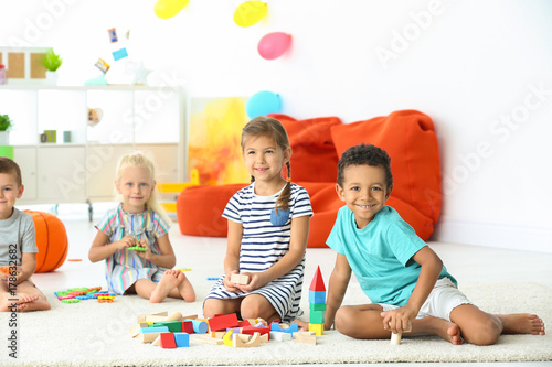 Cute children playing with ...
