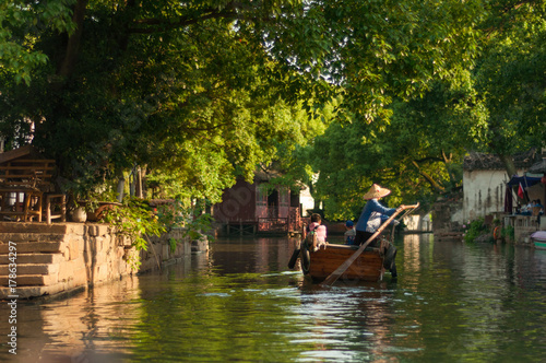 boat tour in Chinese old village by canal