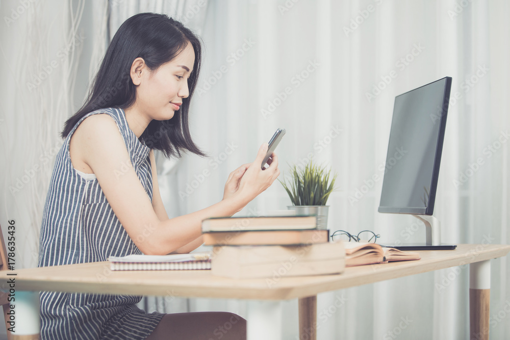 Cheerful business lady working on personal comouter at home . Cheerful business lady working on personal comouter at home .
