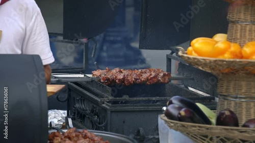 MOSCOW, RUSSIA, JULE 24, 2016: Pork Skewers Turning Automatically On Grill
