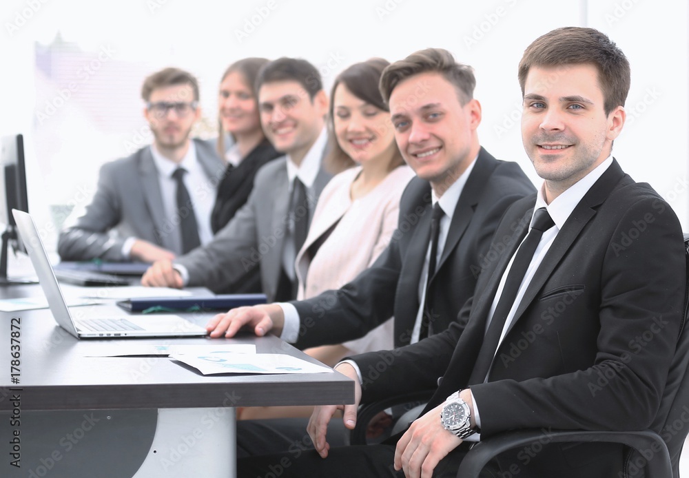 project Manager and professional business team sitting at Desk project Manager and professional business team sitting at Desk