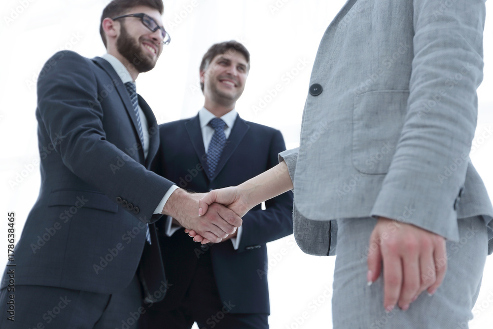 Close-up of business people shaking hands Close-up of business people shaking hands