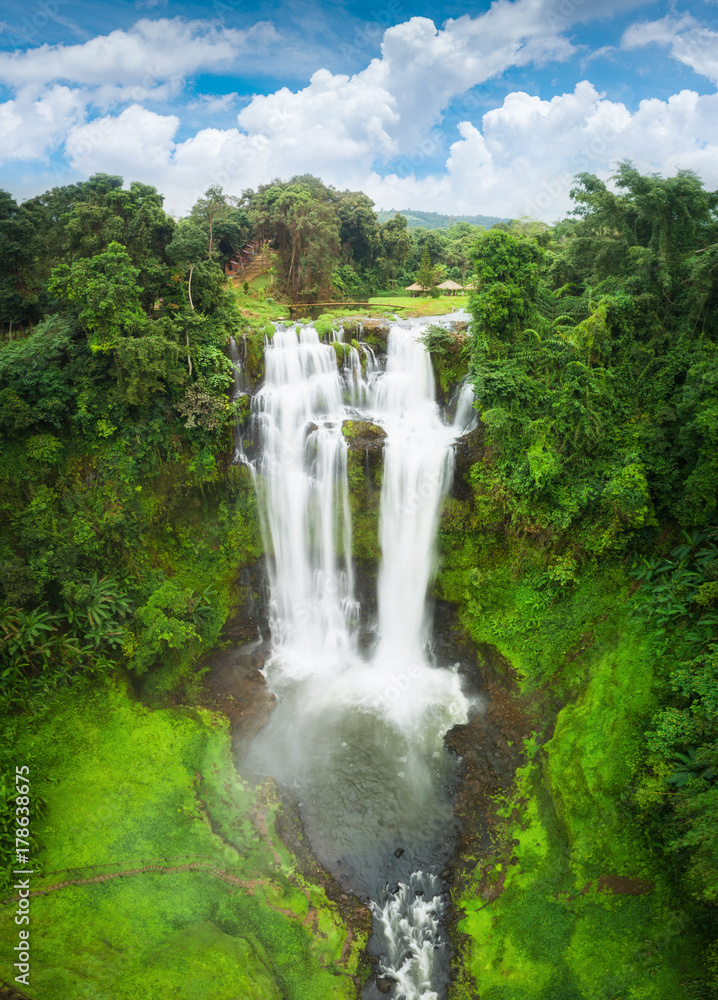 Tad Gneuang Waterfall in Dong Hua Sao National Protected Area, Bolaven Plateau, Champasak Province, Laos. Aerial view drone