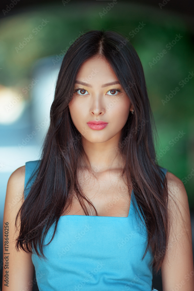 Attractive asian woman portrait StockFoto Adobe Stock