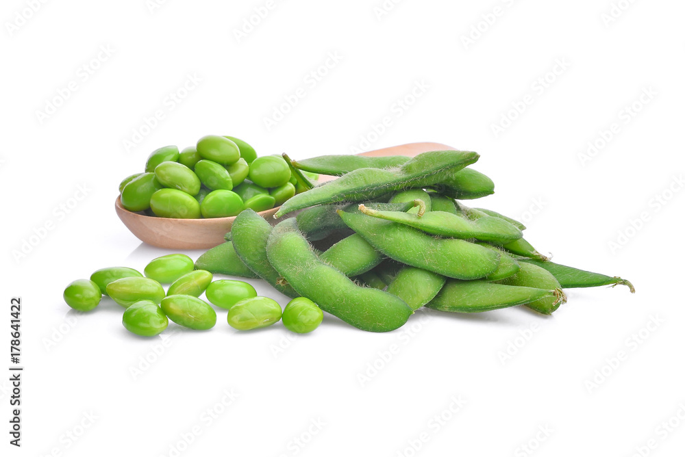 edamame green beans in wooden spoon isolated on white background edamame green beans in wooden spoon isolated on white background