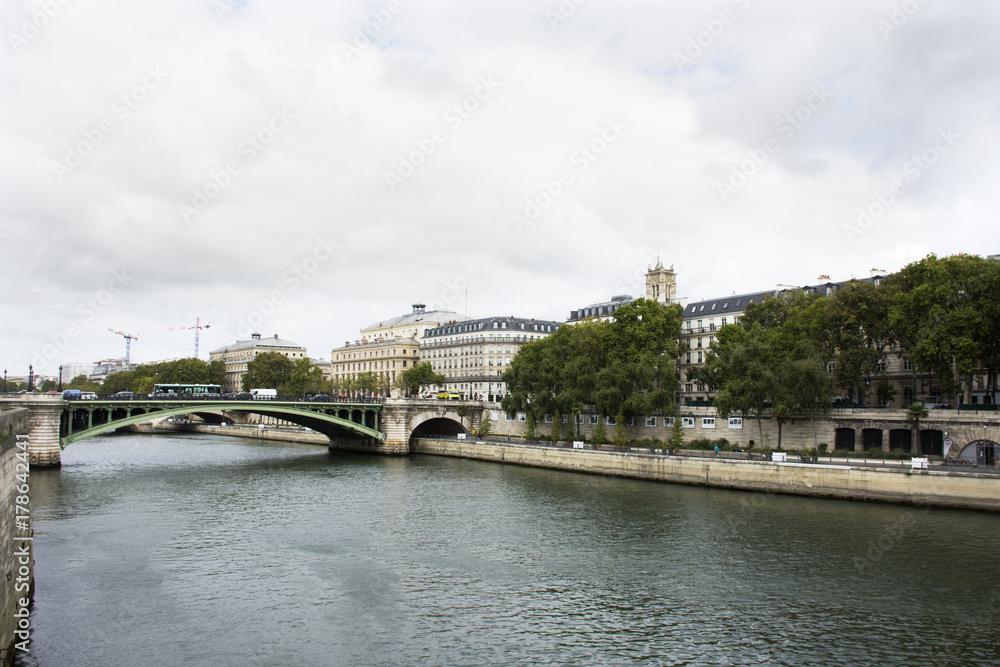 View landscape of Paris city at riverside of Seine river and Prefecture de Police and Theatre de la Villewith traffic road