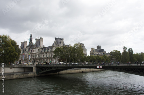 View landscape of Paris city at riverside of Seine river and Hotel de Ville with traffic road