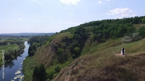 Wallpaper Mural The river with steep banks. On the steep Bank of the river are the young people Torontodigital.ca