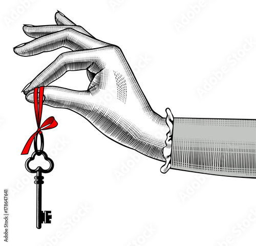 Woman's hand with old key