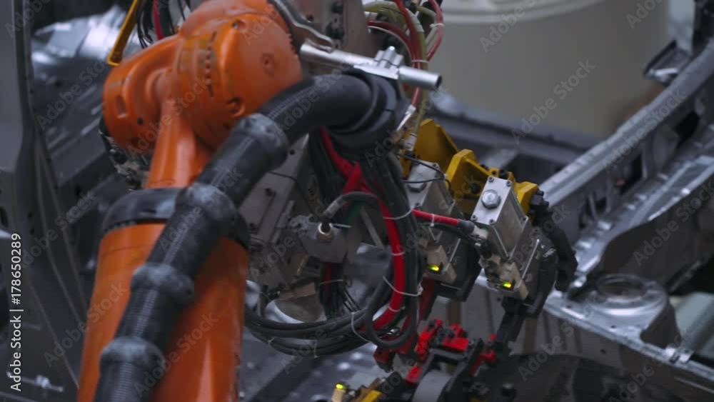 Automobile plant, close-up view of new cars body, modern production of cars.
Automobile plant, close-up view of new cars body, modern production of cars.