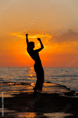Silhouette of a girl dancing
