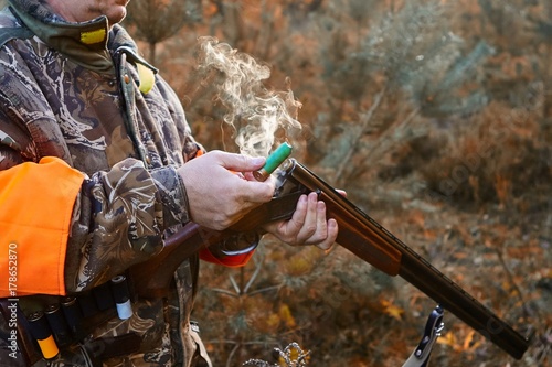 Hunting rifle after firing . Hunting in the forest