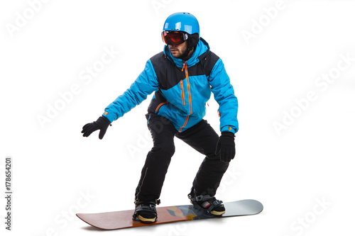 Portrait of young man in sportswear with snowboard isolated on a white background