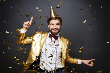 Cheerful man having a fun at party