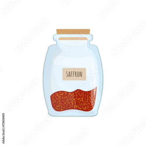 Saffron preserved in glass jar isolated on white background