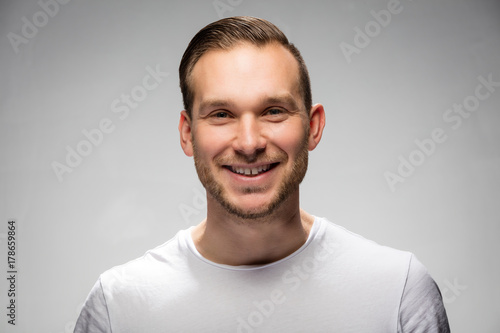 Handsome smiling man. Studio portrait. © Photocreo Bednarek