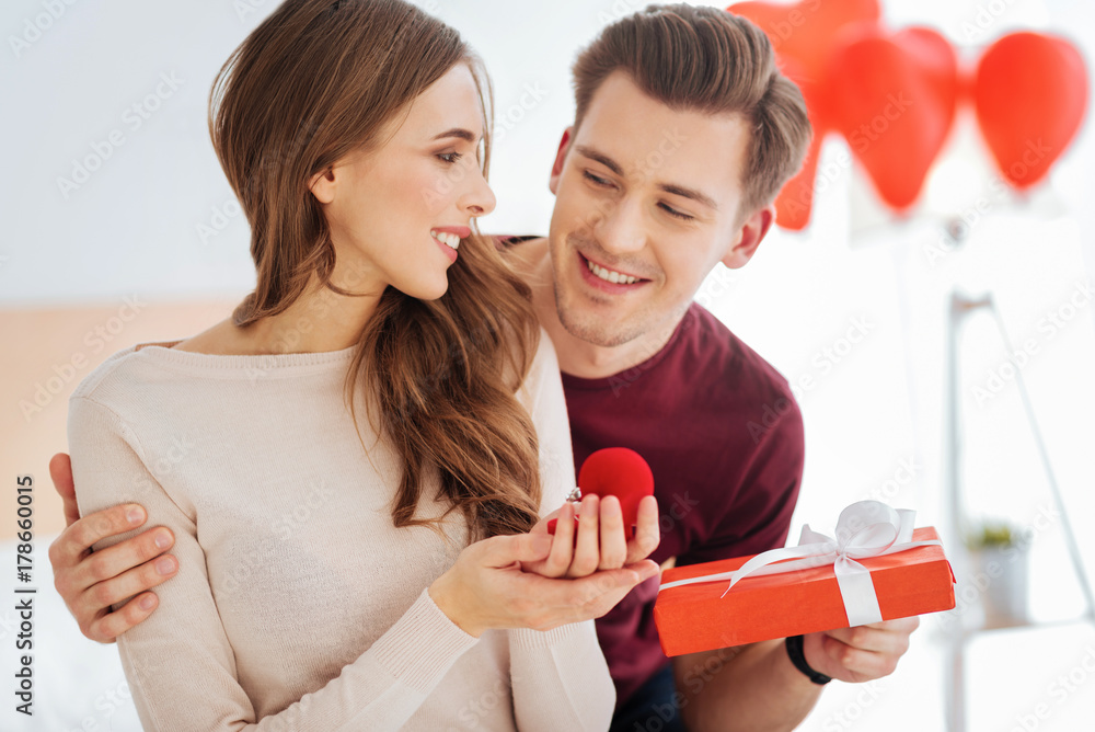 Loving boyfriend surprising his girlfriend with proposal Stock Photo ...