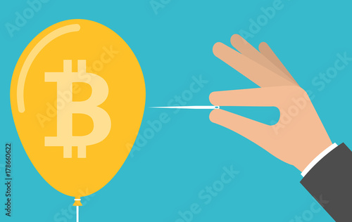 Hand pricking or bursting bitcoin balloon with a needle