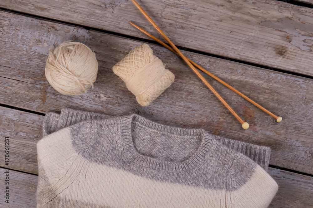 Knitwear sweater and knitting supplies